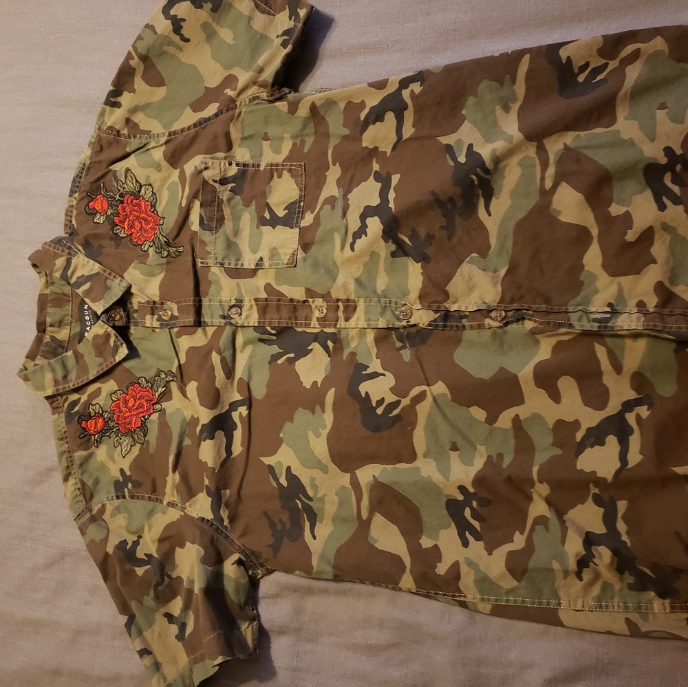 Camo button up shirt with red roses on the upper.